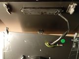 a close up view of a computer screen with wires attached to it