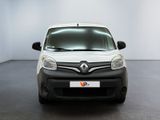 the front view of a white van parked in a white room
