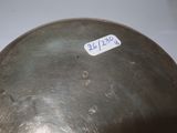 a metal ball with a sticker on it
