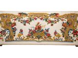 an image of a white and yellow rug with flowers on it