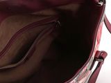 the inside of a purse with a zipper on it
