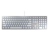 un clavier d'ordinateur posé sur une surface blanche