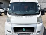 a white van that is parked in a parking lot