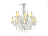 a close up of a chandelier with candles on it