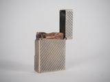 an image of a lighter that is sitting on top of a table