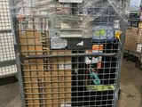 a large metal cage with a bunch of boxes inside of it