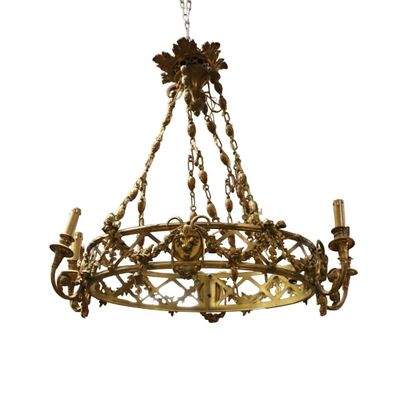 a large brass chandelier hanging from the ceiling
