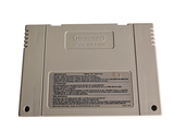 a gameboy game sitting on a white surface