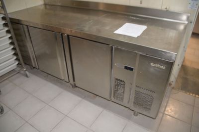 a stainless steel counter in a commercial kitchen