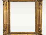 an antique gold frame with a decorative design on the edges