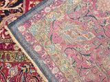 several rugs are laid out on the floor in a room