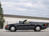 an image of a mercedes sl - class convertible parked in front of a building