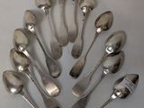 a lot of spoons that are sitting on a table