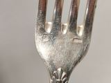 a fork that is sitting on top of a plate