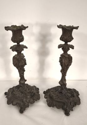pair of antique cast iron candlesticks