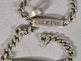 a silver bracelet and a bracelet with a name on it