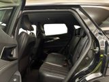 a view of the inside of a car with the door open
