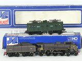 a toy train that is sitting next to a box