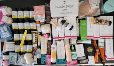 many different types of skin care products displayed on a shelf