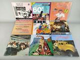 a lot of music books on the table