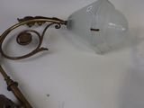 a lamp that is sitting on a table next to a lamp