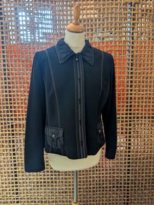a black jacket on a mannequin mannequin mannequin mannequin mannequin mannequin mannequin mannequin mannequin