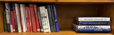 many books on a book shelf in a library