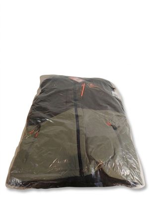 a bag of clothing wrapped in plastic on a white surface
