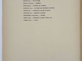 an open book with a black and white title on it