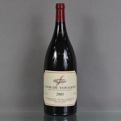 a bottle of wine that is sitting on a table