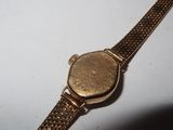 a watch that is sitting on top of a table
