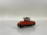 an image of a toy train on a white surface with a white background