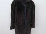 the coat is brown and black with black trims on it