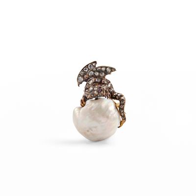 an image of a pearl and diamond ring on a white background