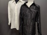 two mannequins in front of a black and white shirt and a white shirt