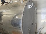 a large metal tank that is sitting in a room