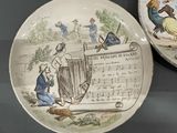 two plates that are sitting on a table