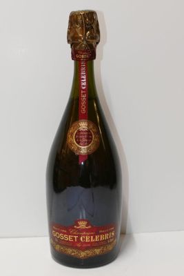 an image of a bottle of champagne sitting on a table