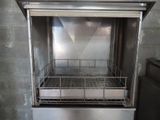 a stainless steel oven with a door open in a kitchen