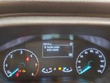 a close up of a car dashboard with a speedometer