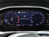 the dashboard of a car with a digital display on it