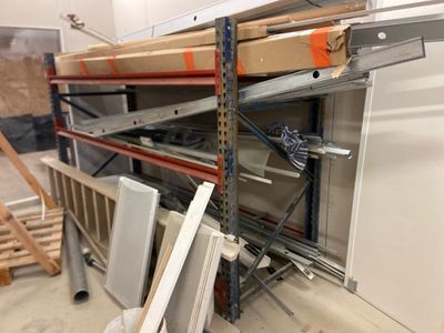 a rack with a lot of items on it in a room