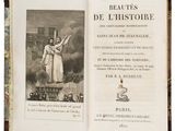 an old book with a picture of a woman holding a cross