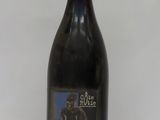 a bottle of wine that is sitting on a table