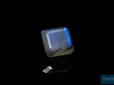 an image of a square stone with a blue glow on it