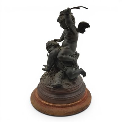 an image of a statue of a man on a horse with two children