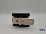 a close up of a watch strap on a white surface