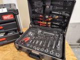a tool case with tools in it sitting on a table