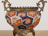 a large vase with a decorative design on it