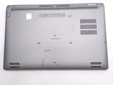 a laptop with a broken screen sitting on a table
